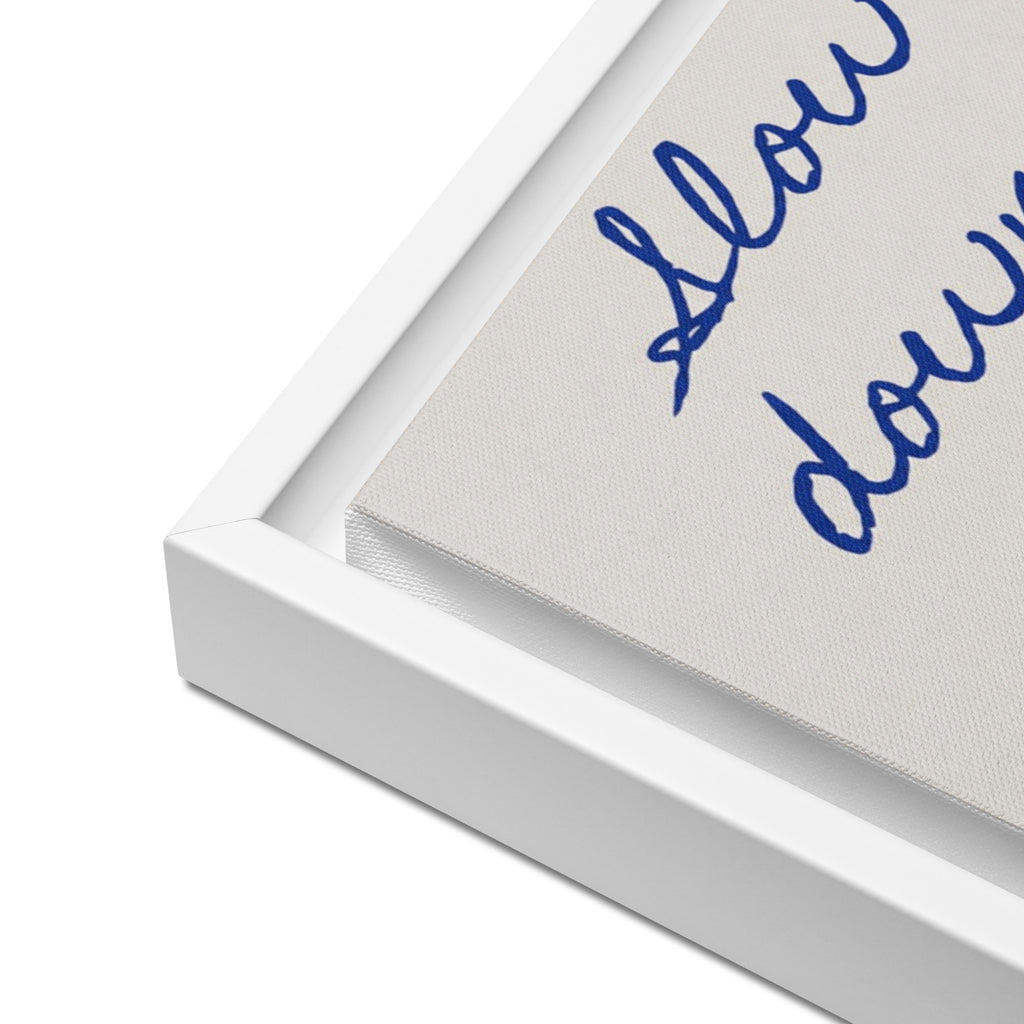 Inspirational quote canvas print in white frame – "Slow down you're doing fine" in blue handwriting / Картина с вдъхновяващ цитат в бяла рамка – „Забави се, справяш се добре" в синьо ръкописно