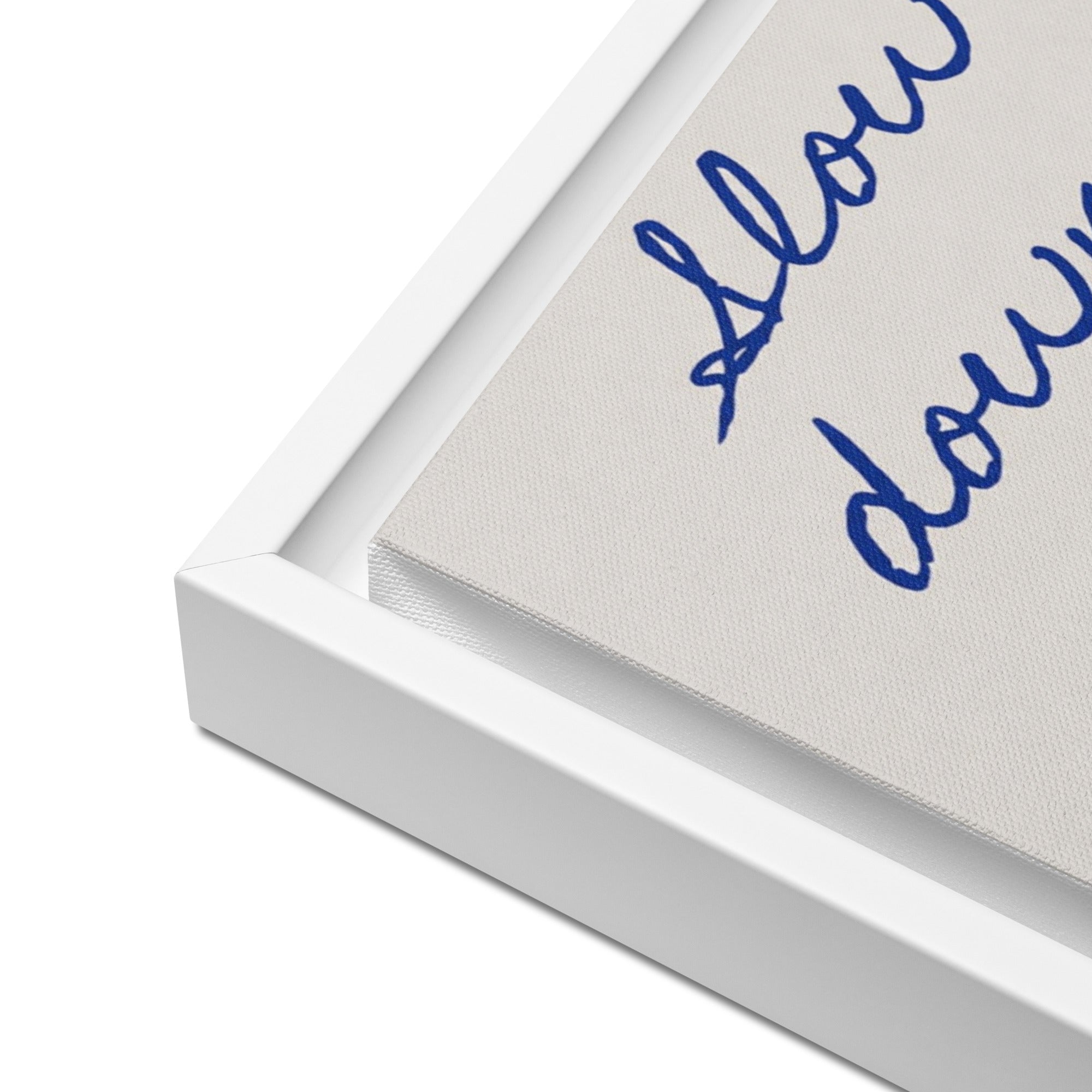Inspirational quote canvas print in white frame – "Slow down you're doing fine" in blue handwriting / Картина с вдъхновяващ цитат в бяла рамка – „Забави се, справяш се добре" в синьо ръкописно